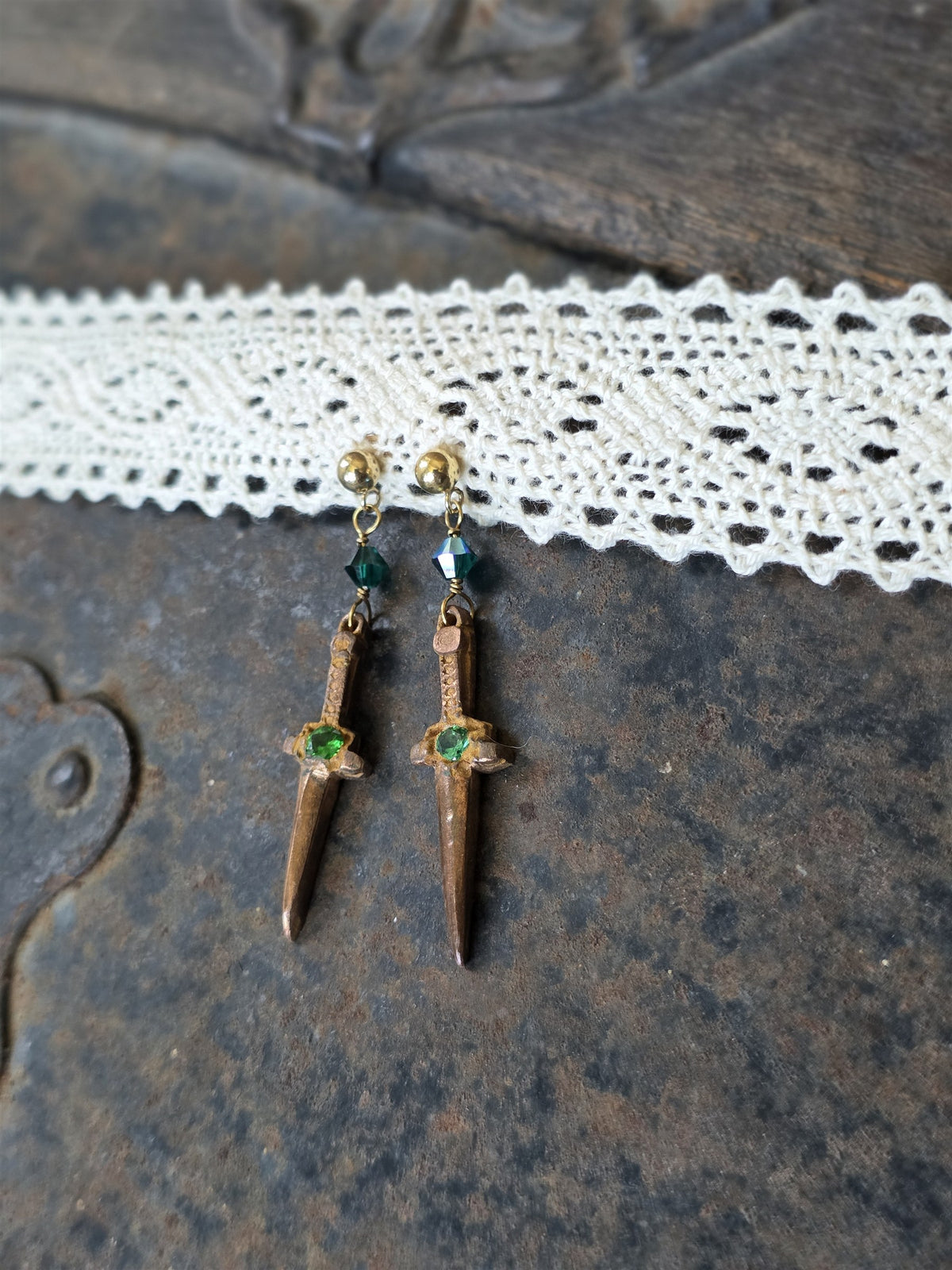 Forest dagger earrings with dark green crystals