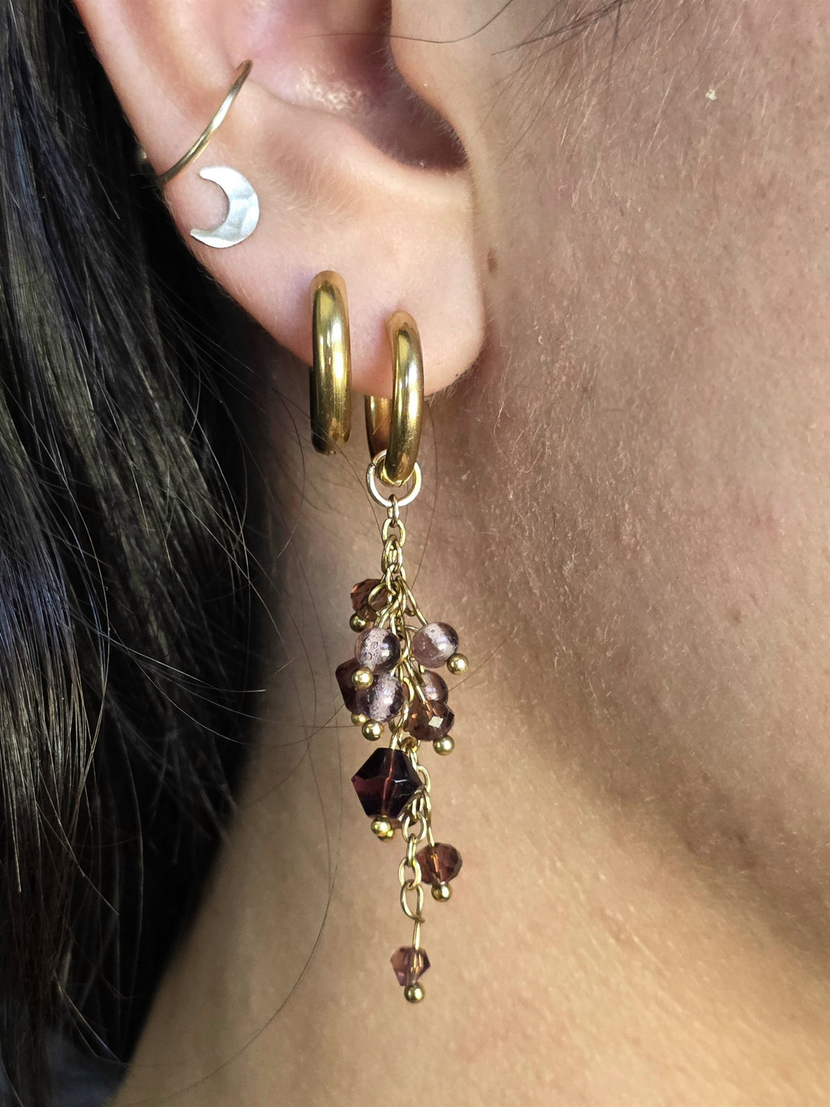 Plum crystal cluster earring worn, close-up