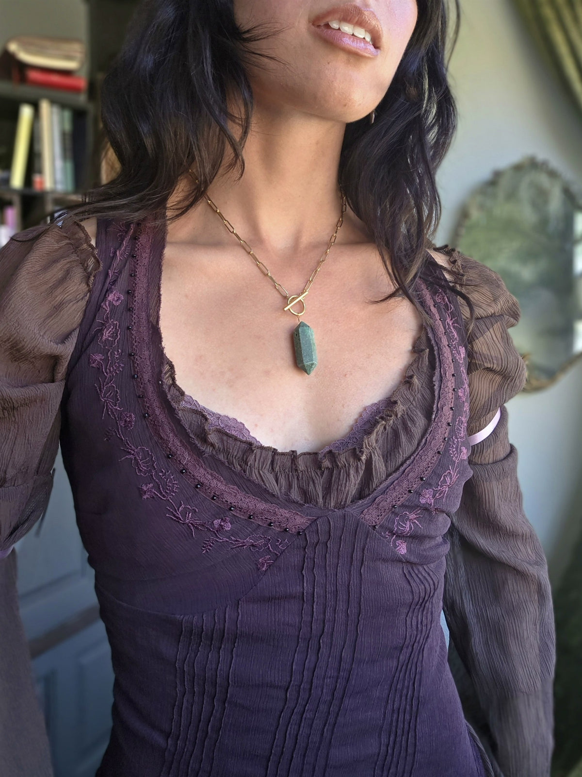 Jade single pendulum necklace, worn