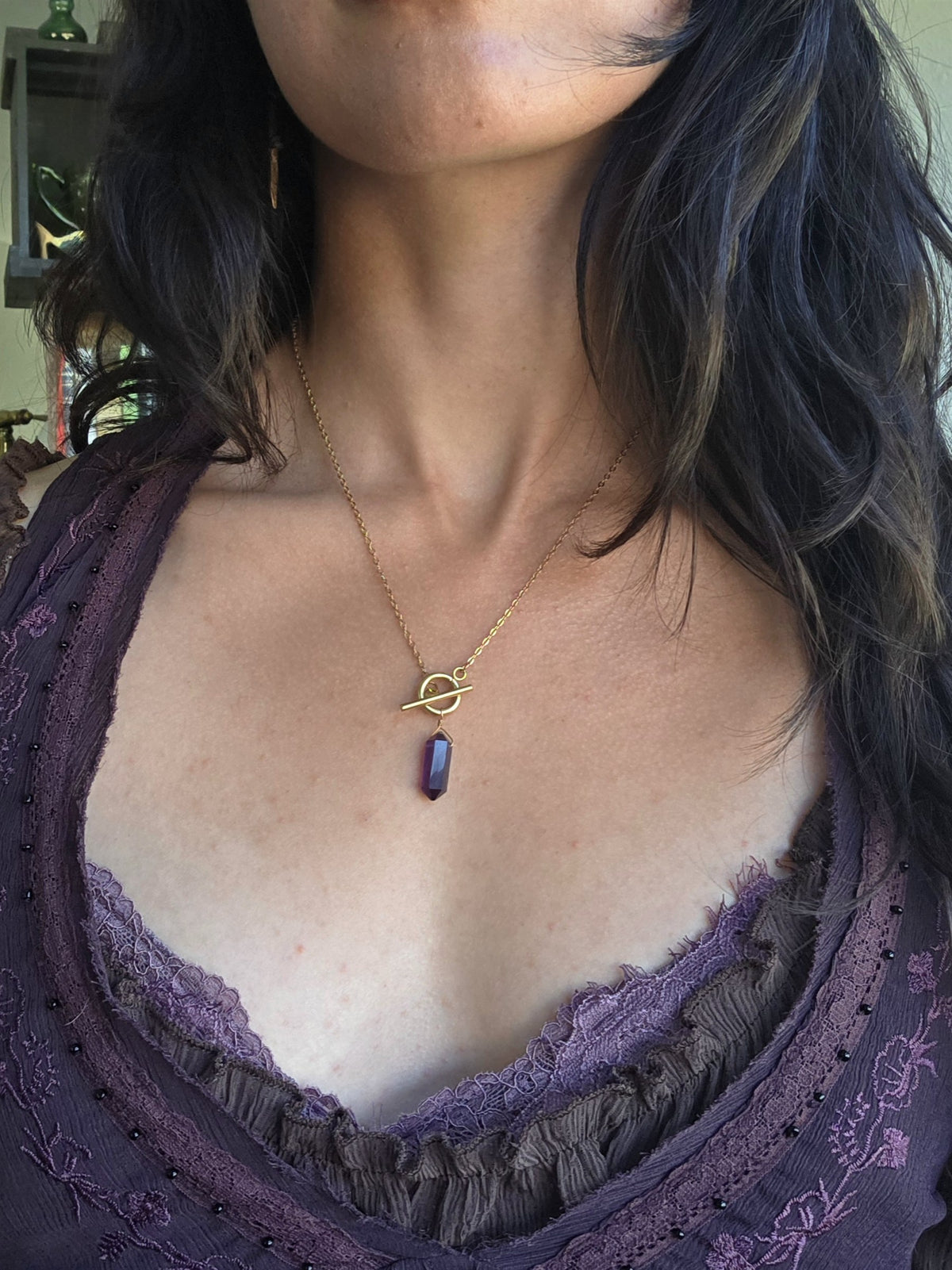 Amethyst pendulum necklace on gold stainless steel, worn