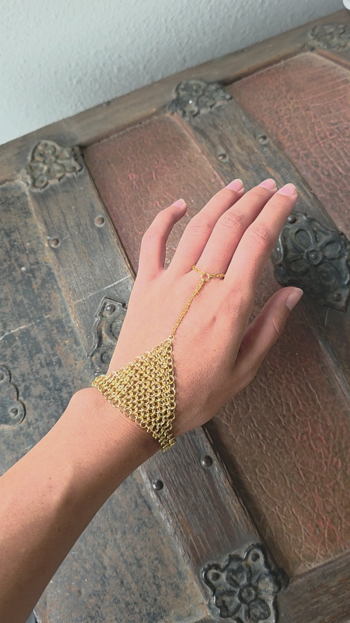 Gold chainmaille hand chain video